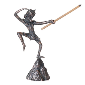 Detail of vintage metal Monkey King incense holder with bronze finish for home decor