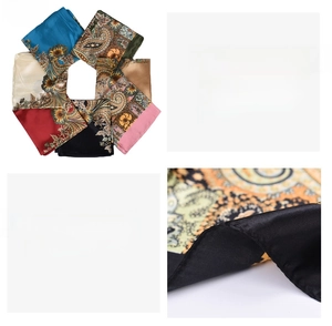 Detailed view of satin square scarf featuring vintage paisley floral patterns and hemmed edges