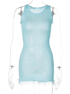 Detail of light blue sleeveless mini dress featuring knit texture and long fringe hem