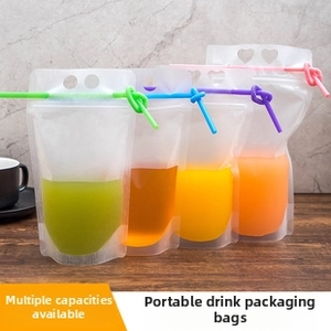 Frosted translucent drink pouch with handle and colorful straw for fresh fruit juices