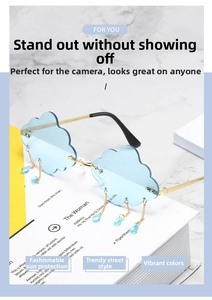 Cloud-shaped rimless sunglasses with blue lenses and dangling waterdrop tassels