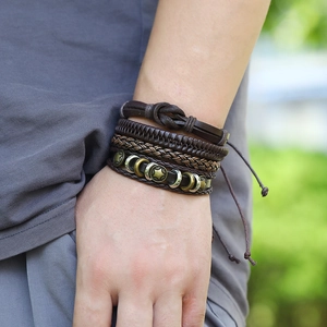Men's multi-layer leather bracelet set with retro metal star and moon charms on wrist