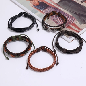 Detail shot of multi-layer retro woven leather bracelets with star rivet and adjustable ropes