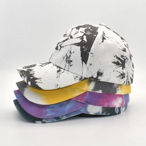 Side view detail of tie-dye baseball caps showing vibrant fabric texture and patterns