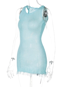 Close-up of light blue sparkling knit mini dress with tassel hem and mesh texture
