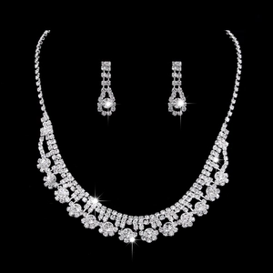 Silver bridal jewelry set with floral crystal necklace and matching drop earrings