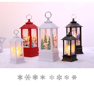 Detail of Christmas lantern with LED candle, santa pattern and bronze finish