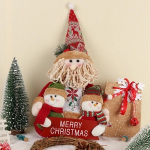 Handcrafted plush Santa Claus figure with snowman and Merry Christmas sign home decor