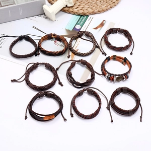 Set of 10 vintage multilayer braided leather bracelets with wooden beads and metal charms
