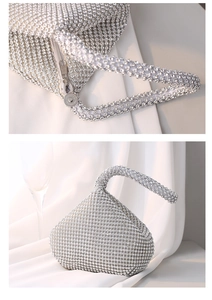 Detailed view of handmade silver rhinestone evening bag with elegant draped background