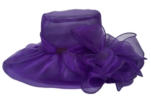 Detail of elegant dark purple organza sun hat with large floral decoration and wide brim