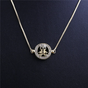 Gold skull pendant necklace with sparkling rhinestones and box chain for men's fashion
