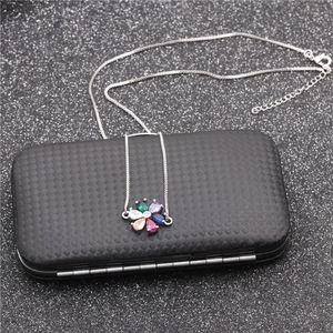 Micro-set flower pendant necklace with colorful cubic zirconia on black jewelry box