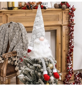 Detailed Christmas gnome tree topper with gray snowflake knit hat and long white beard