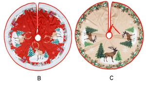 Detail view of two Christmas tree skirts featuring reindeer, pine trees, and snow patterns