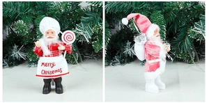 Détails des figurines de Père Noël chef et rose avec tablier brodé Merry Christmas