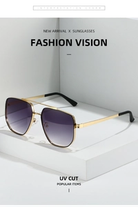 Makro-Detail einer goldenen Metall-Sonnenbrille mit lila UV-Verlaufsschutzgläsern