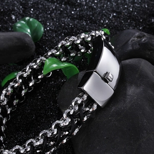 Handmade woven leather and stainless steel bracelet with polished metal clasp for men