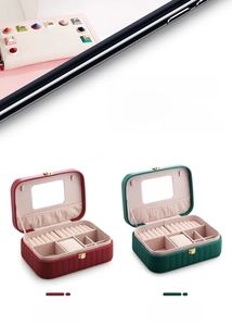 Close-up of portable PU leather jewelry box with mirror, ring slots and metal clasp
