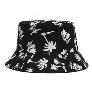 Black bucket hat with white coconut tree and flamingo prints for sun protection
