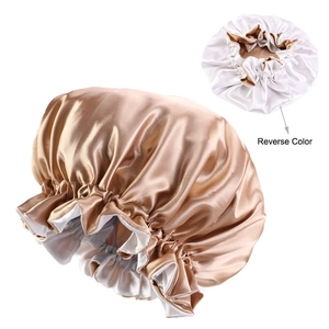 Detail showing the reversible double-layer satin bonnet in champagne and white