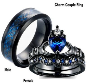 Detail of 18K GP black and blue heart sapphire couple ring set with inner engraving