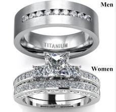 Detailed view of titanium couple ring set with sparkling crystals for men and women