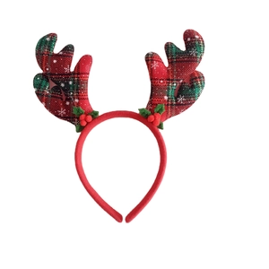 Christmas reindeer headband with red and green plaid antlers and holly berry decoration