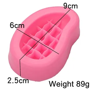 Pink silicone mango candle mold with grid texture measuring 9x6x2.5cm and weighing 89g