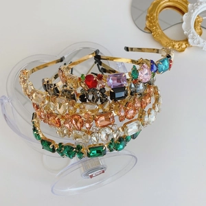 Detail of baroque crystal headbands with colorful rhinestones on gold alloy frame
