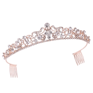 Detail of rose gold bridal tiara with sparkling crystal rhinestones and side combs
