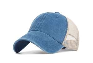 Detailed macro view of the navy denim fabric and breathable mesh back of this baseball cap