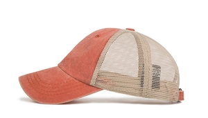 Side view of orange and beige breathable mesh baseball cap with adjustable strap