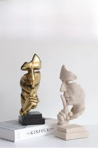 Détails des sculptures créatives 'Le silence est d'or' en finitions or et grès