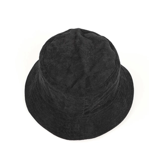 Detailed top view of a black corduroy bucket hat showing the fine ribbed fabric