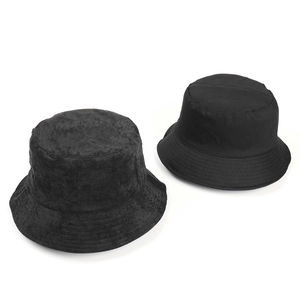 Close-up showing corduroy and smooth cotton textures of black bucket hats set