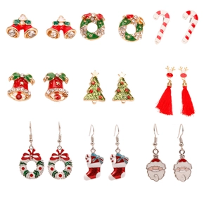 Detail view of 9-pair Christmas earring set with bells, trees, and reindeer designs