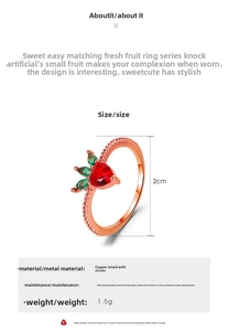 Macro detail of strawberry ring showing red heart zircon and copper metal properties