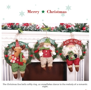 Detailed view of handmade Christmas wreaths with Santa, snowman and elk doll on white fireplace