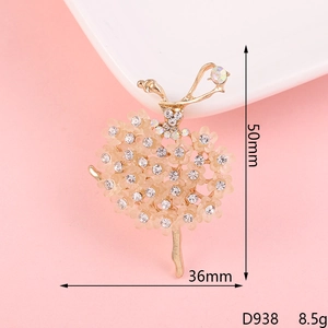 Detailed size view of golden alloy ballerina charm with floral petals and crystals