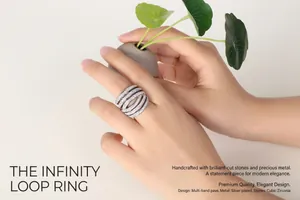Close-up of sparkling multi-layer pavé silver ring worn by a model on artistic background