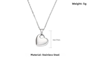 Detail view of heart-shaped stainless steel pendant measuring 18x17mm and weighing 5g