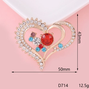 Colorful heart-shaped rhinestone alloy brooch in gold finish measuring 50mm x 43mm