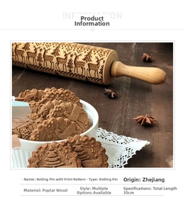 Close-up of engraved reindeer and forest patterns on a 35cm wooden rolling pin