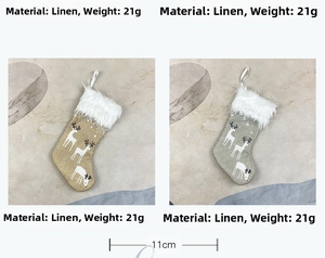 Detail of burlap Christmas stockings with plush cuff and reindeer print, 11cm width