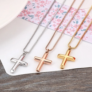 Set of minimalist cross necklaces in silver, rose gold, and gold on box chains