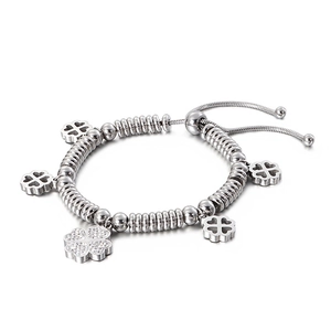 Silver four leaf clover charm bracelet with sparkling crystals and adjustable snake chain