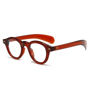 Lunettes de soleil ovales photochromiques avec monture vintage ambre et rivets en métal
