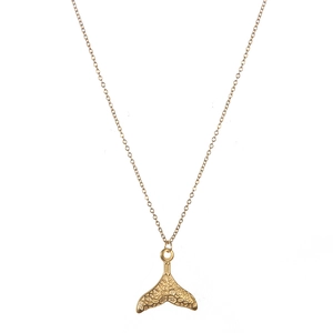 Minimalist gold mermaid tail necklace with a fine cross chain on a clean white background