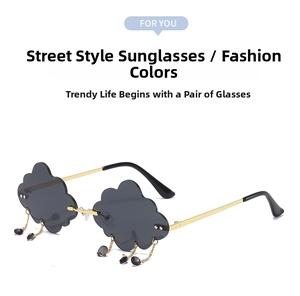 Detailed view of cloud-shaped rimless sunglasses with metal chain and water drop pendants